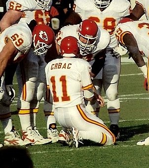 File:Chiefs players in huddle cropped.jpg