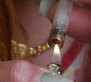 A love rose being used to smoke crack cocaine Smoking Crack crop.jpg