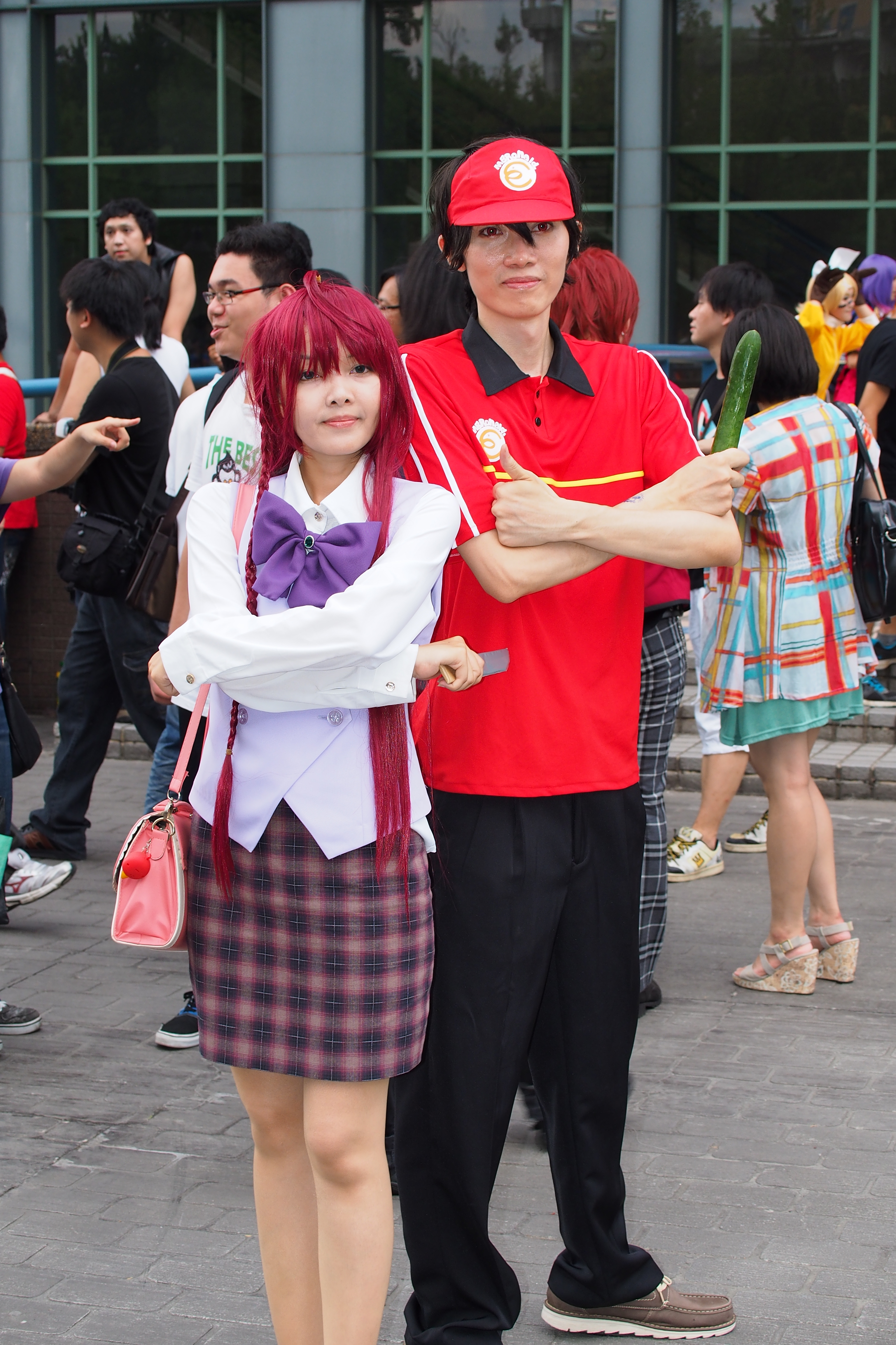 Cosplayers of Emi Yusa and Sadao Maou from The Devil Is a Part-Timer 2013.....