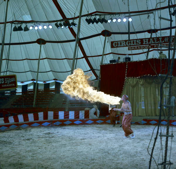 File:Fire breather Tagora rehearsing for Garry Moore's show at the Circus Hall of Fame- Sarasota, Florida (9044035834).jpg