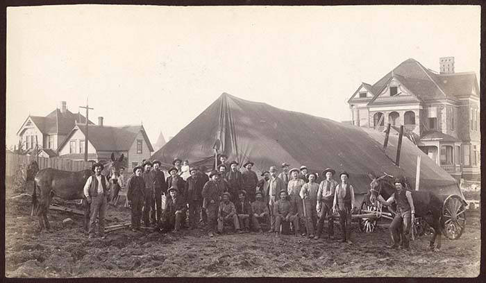 File:Men posing in front of tent near Jacob Furth home, 1889 (MOHAI 9550).jpg