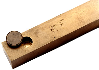 End of the standard yard of 1855 showing the gold plugs which bore the markings for the standard yard