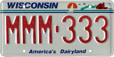 1987 Wisconsin license plate, displaying the farm graphic and the state's slogan.