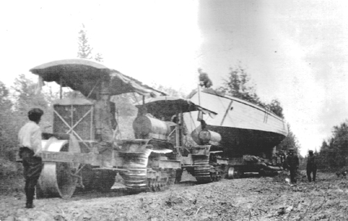 File:A tractor tows the HBC vessel Aklavik over the Fort Smith portage, in 1923.jpg