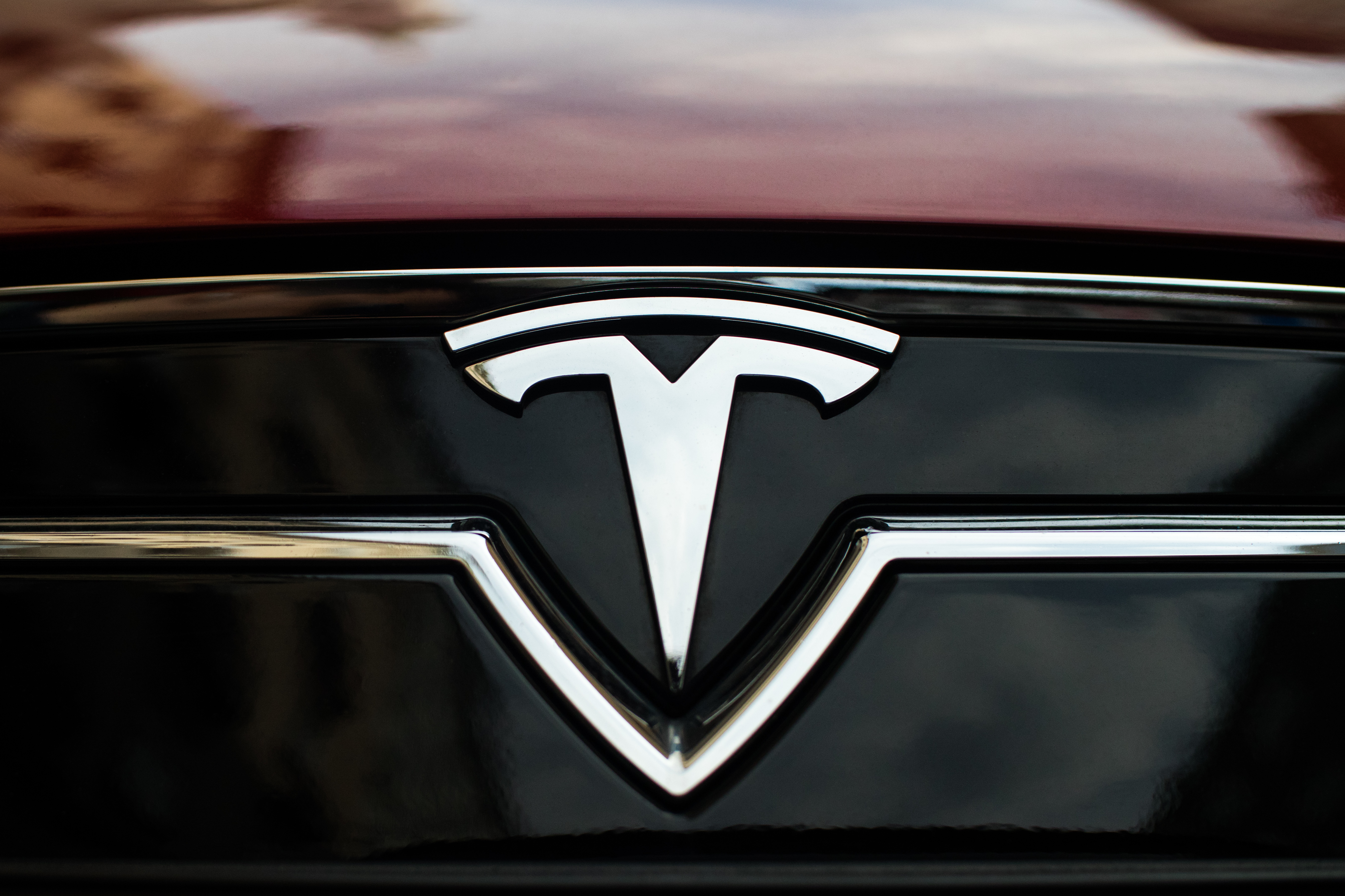 TESLA badge on a car.jpg