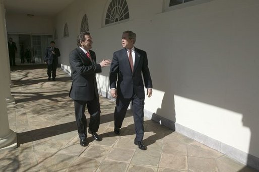 File:German Chancellor Gerhard Schroeder walks with President George W. Bush along the colonnade in the Rose Garden.jpg