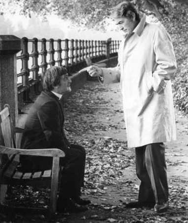 Troughton (left) in a publicity still for the 1976 film The Omen