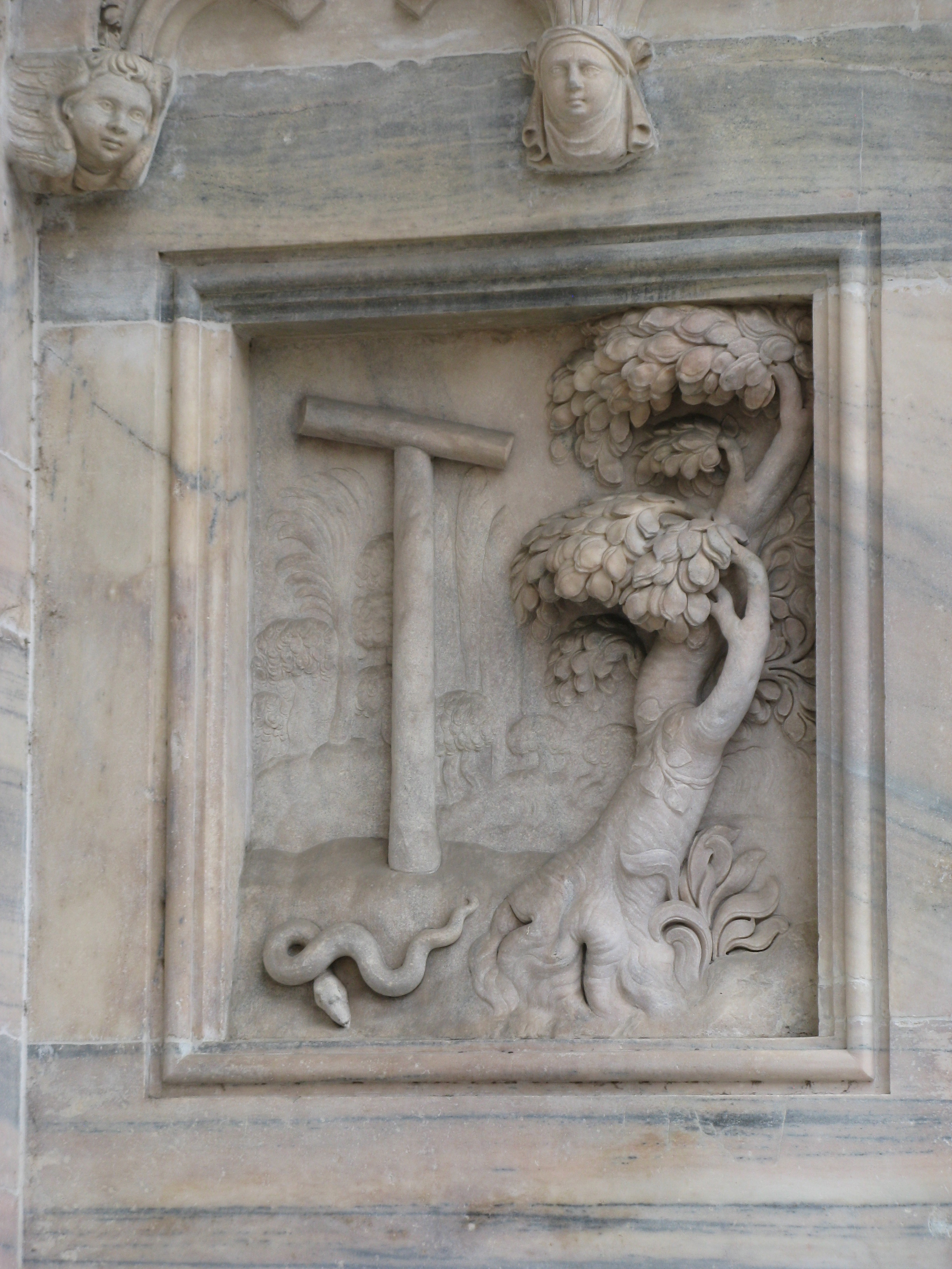 A relief at Exterior of the Duomo (Milan) -Tree of Knowledge and Tree of the Cross of Christ By Yair Haklai (Own work) [CC BY-SA 3.0 (http://creativecommons.org/licenses/by-sa/3.0) or GFDL (http://www.gnu.org/copyleft/fdl.html)], via Wikimedia Commons