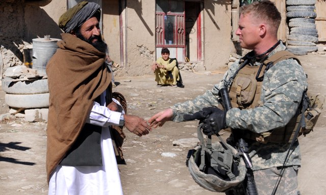 File:100301-A2095R-005- PAKTYA PROVINCE, Afghanistan - U.S. Army Maj. Christian Jenni of Orem, Utah, Alpha Company commander with the 405th Civil Affairs Battalion from Pleasant Grove, Utah, greets a local resident 100301-A-OQ227-005.jpg