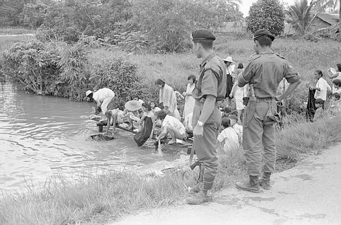 File:Armed soldiers stand guard in Sarawak, 1965.jpg