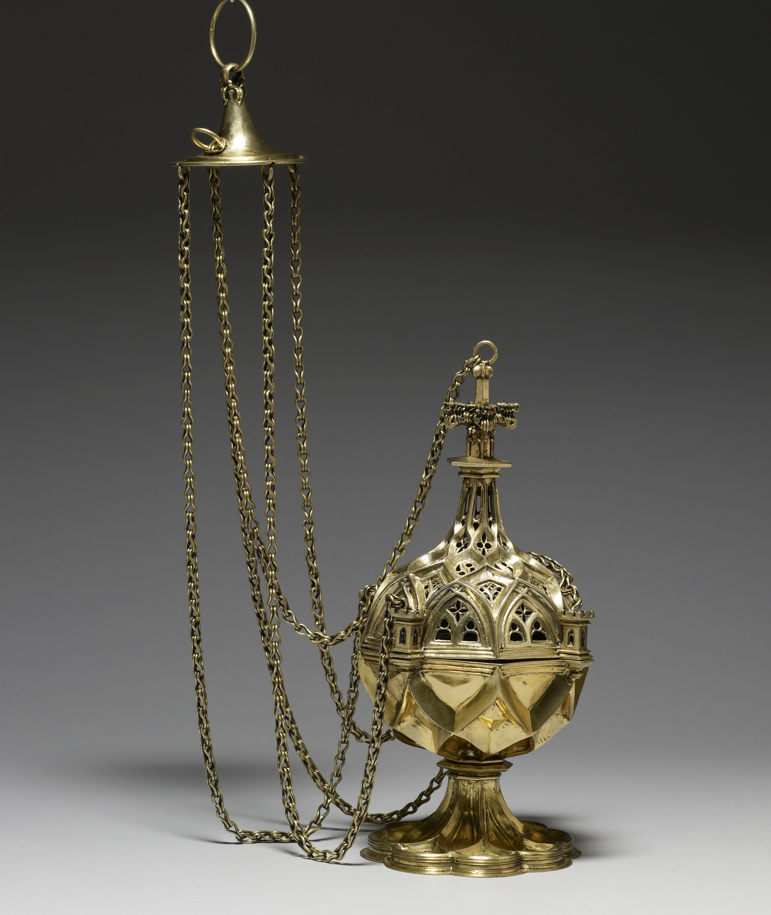 This censer made in Germany is typical of the style popular in western Europe at the end of the fifteenth century. The intersecting raised bands mimic the complex vaulting systems used in late Gothic churches, and the openwork areas are reminiscent of the tracery found in the windows of these buildings.
