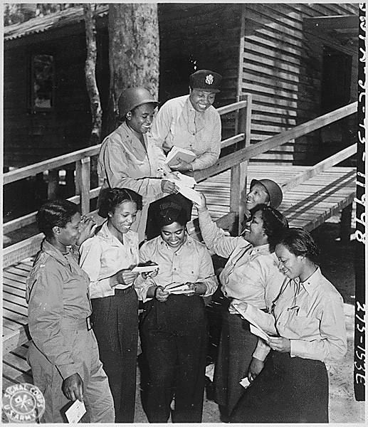 File:"A contingent of 15 nurses,...arrive in the southwest Pacific area, received their first batch of home mail at their station." 268th Station Hospital, Australia. Three of the nurses are Lts. Prudence L. Burns, Inez(...) - NARA - 531410.gif