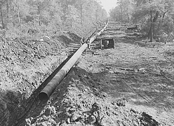 File:Big Inch pipeline running through wooded land.jpg