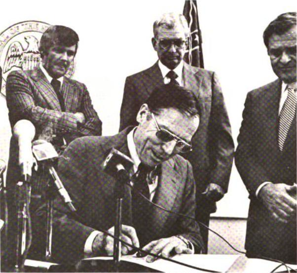 File:Governor William F. Winter signs Uniform Personnel Act, 1980.png