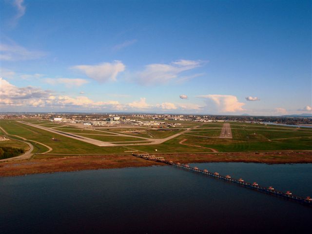 File:Landing runway 12 Vancouver (464787162).jpg