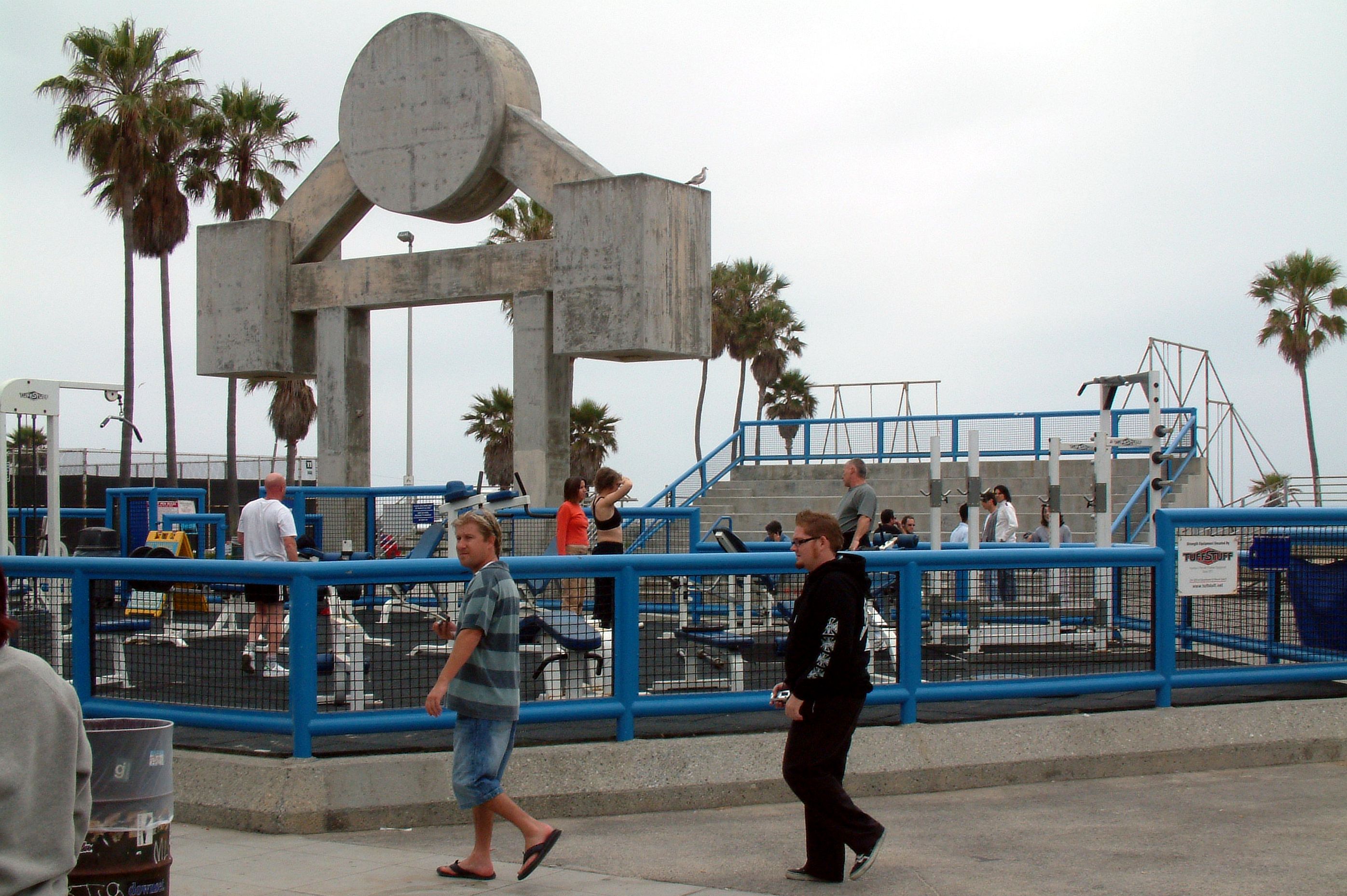 People exercising at the Muscle Beach Venice Outdoor Gym