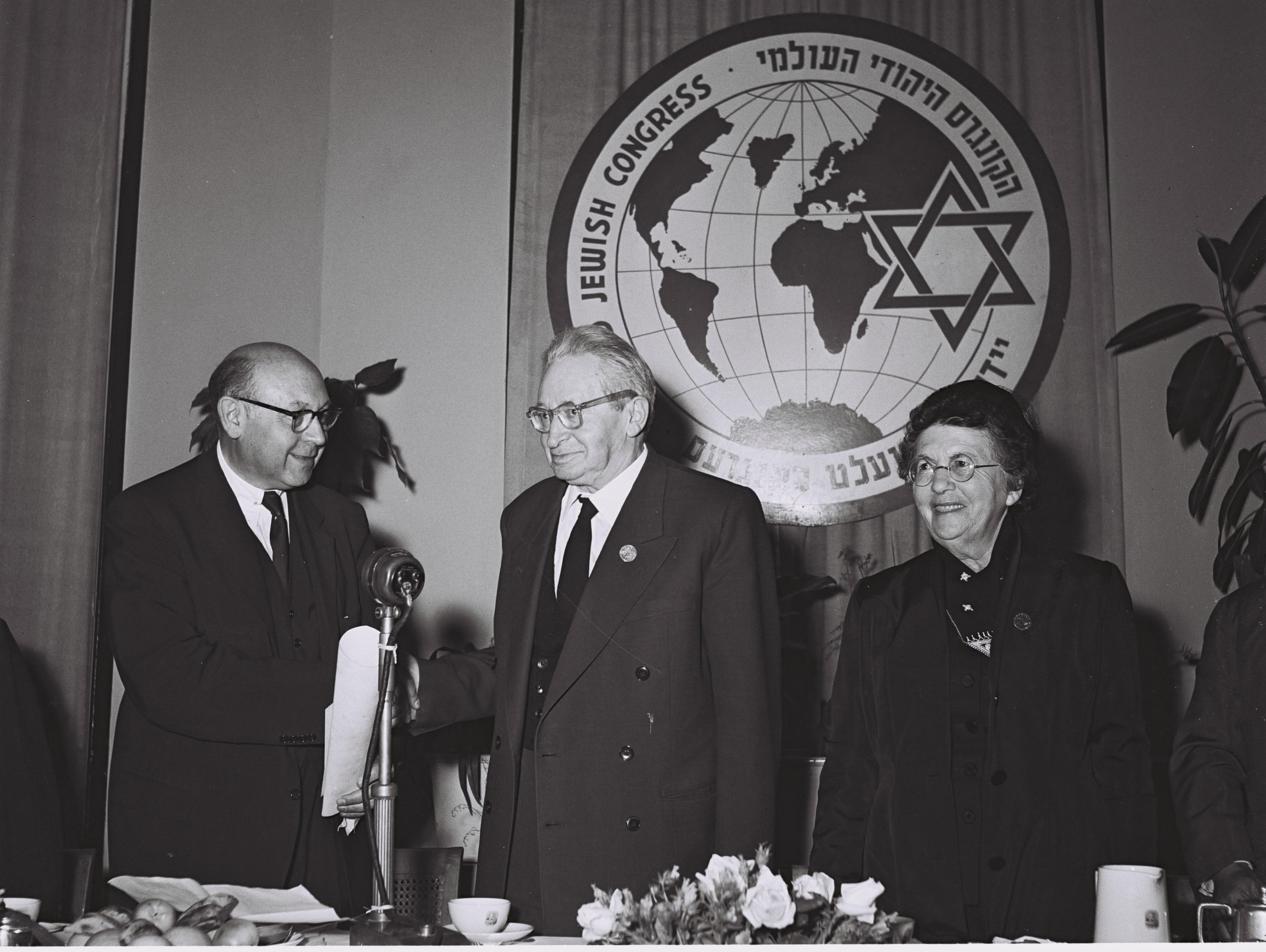 Dr. Israel Goldstein awards the Stephen Wise award to President Yitzhak Ben Zvi at the World Jewish Congress held in 1956 at the King David Hotel in Jerusalem.