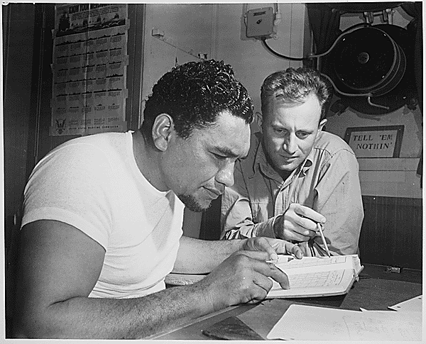 File:"Aboard a Victory ship en route to the Pacific war zone, Chief Mate Earl Stanfield coaches Bos'n Maxie Weisbarth (with whiskers) in mysteries of navigation." - NARA - 542399.gif