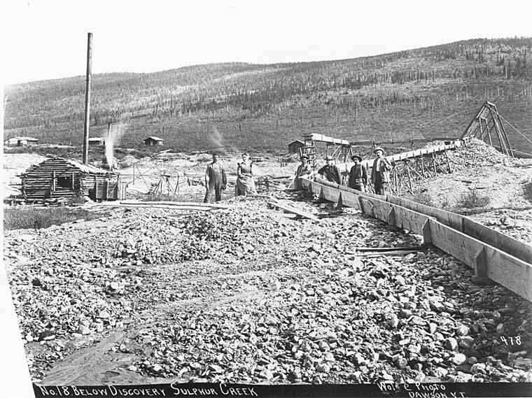 File:Several men and one woman standing around sluicing equipment at claim No 18 Below Discovery on Sulphur Creek, Yukon Territory (AL+CA 2308).jpg