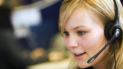 File:A woman working on a call centre.jpg