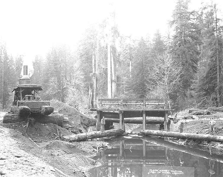 File:Crew with donkey engine and dam gate on stream, Wynooche Timber Company, ca 1921 (KINSEY 1050).jpeg