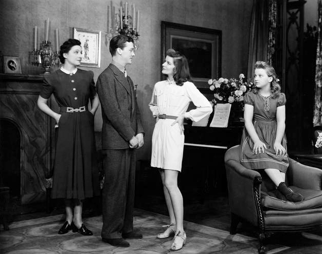  Photograph of Vera Allen, Dan Tobin, Katharine Hepburn and Lenore Lonergan in the 1939 stage production The Philadelphia StoryFeature story is titled "Philadelphia Story on Clothes" (no author credit)Photo caption reads as follows:She does well by a play-suit of oyster-beige, with two colossal pockets and a leather belt.
