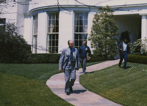 File:Ford walking on sidewalk between Oval Office and South Driveway 2B.jpg