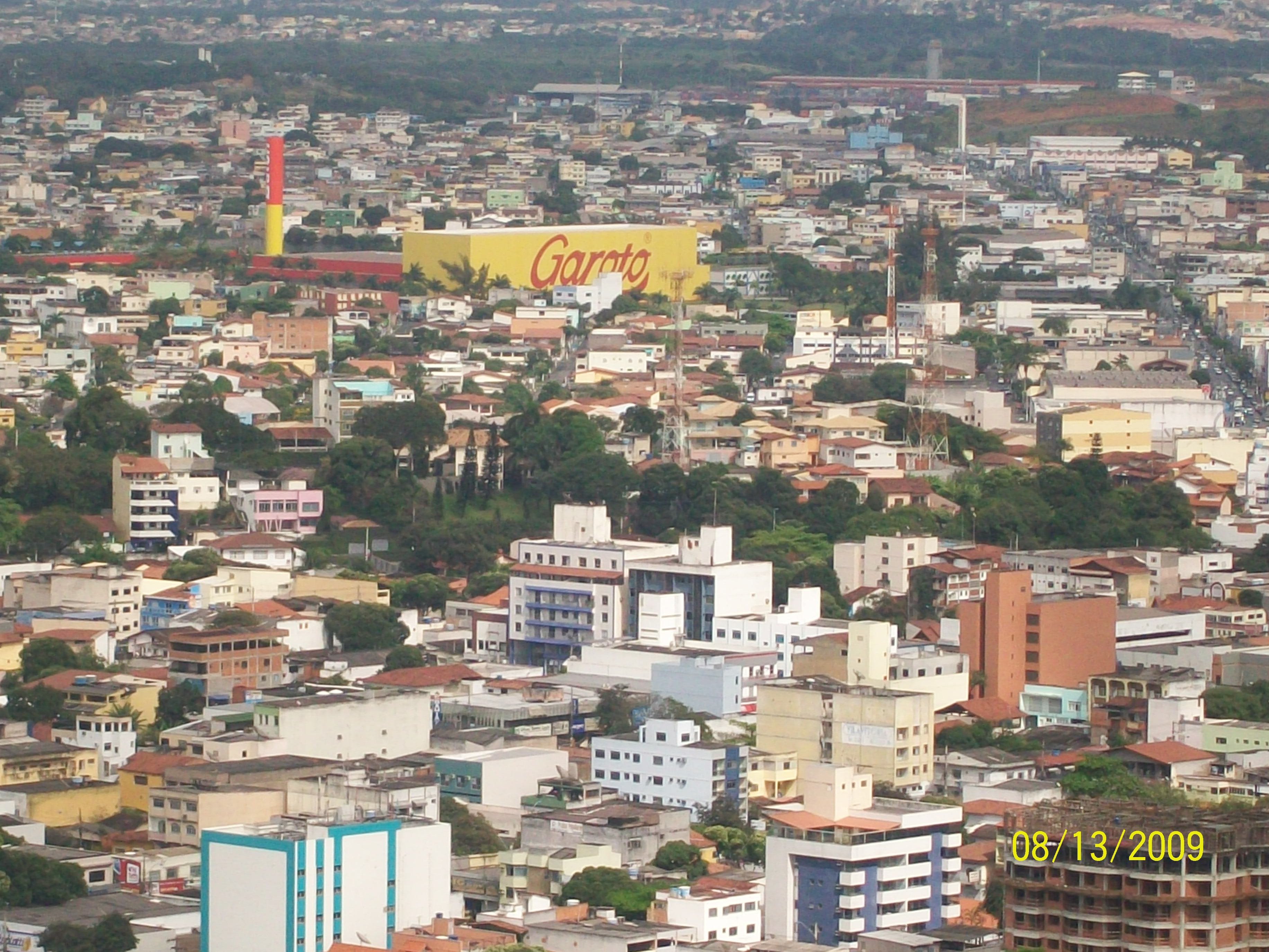 Panoramic view of Brazilian city Vila Velha with the yellow and red Garoto factory.