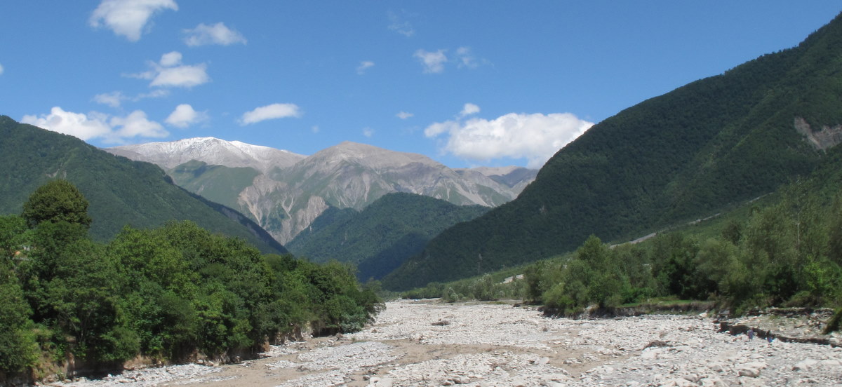 A photo of the mountains and forests of the Caucasus