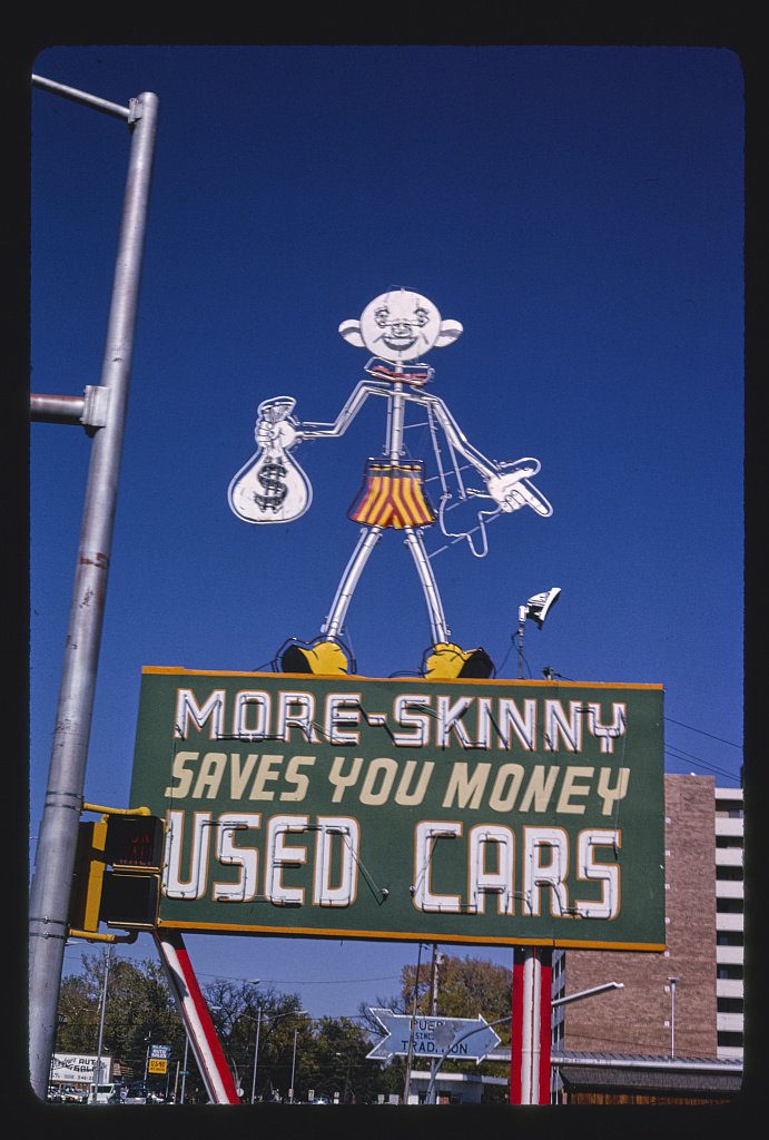 More_Skinny_Used_Car_sign%2C_Santa_Fe_Avenue%2C_Pueblo%2C_Colorado_LOC_38235330156.jpg