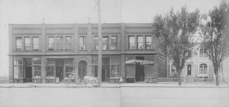 File:Businesses on the 1100 block of the west side of 3rd Ave and on the first half of the block from Spring St to Seneca St, ca 1901 (SEATTLE 3909).jpg