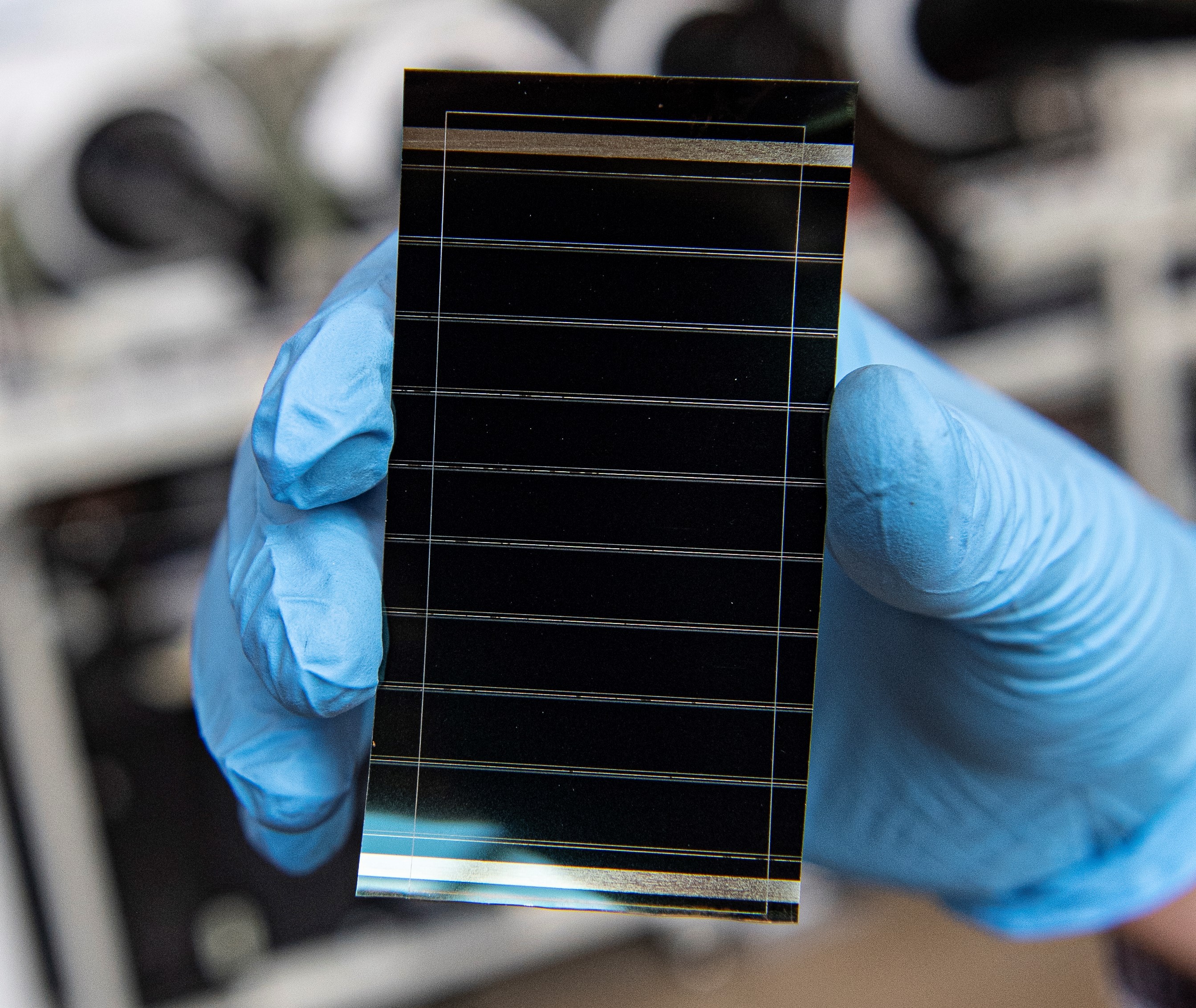 Tiny holes turn silicon solar cells transparent, Research