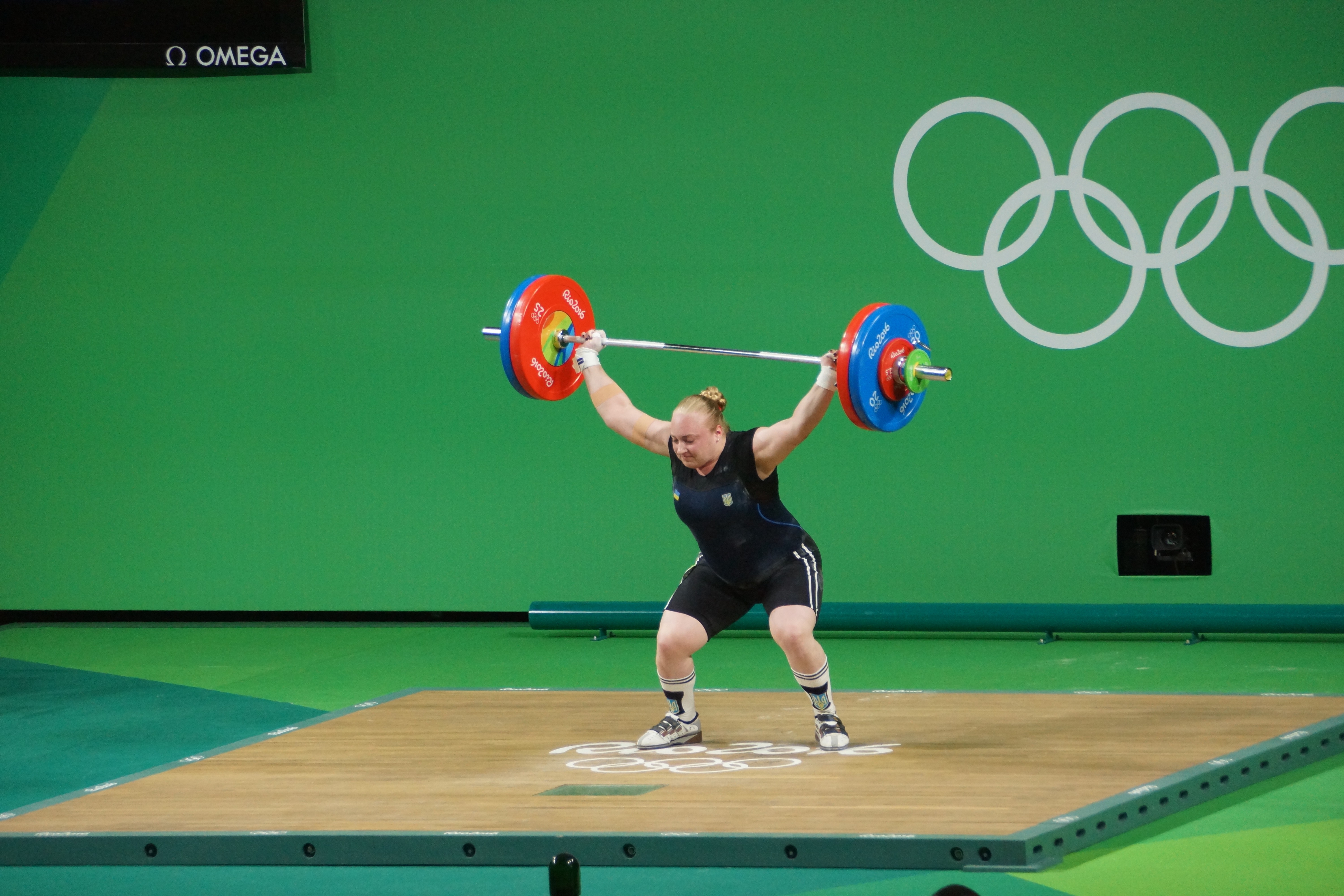 Cual es el peso de la barra olimpica