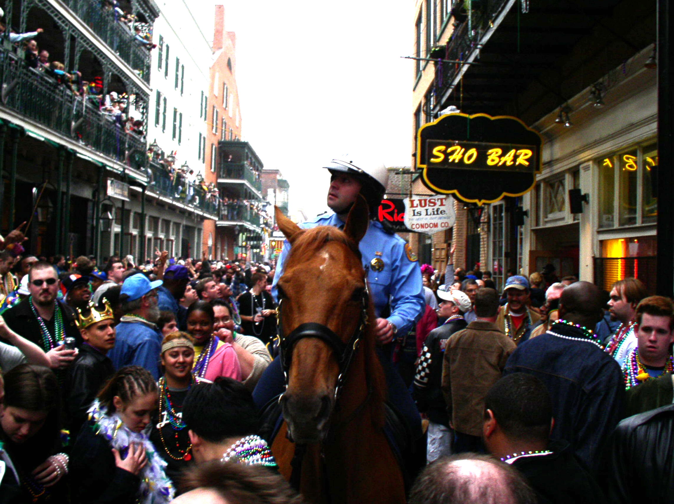 Mounted Police on Bourbon Street Mardi Gras 2003.jpg. 