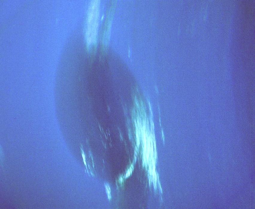 dark on the spot from voyager 2 neptune