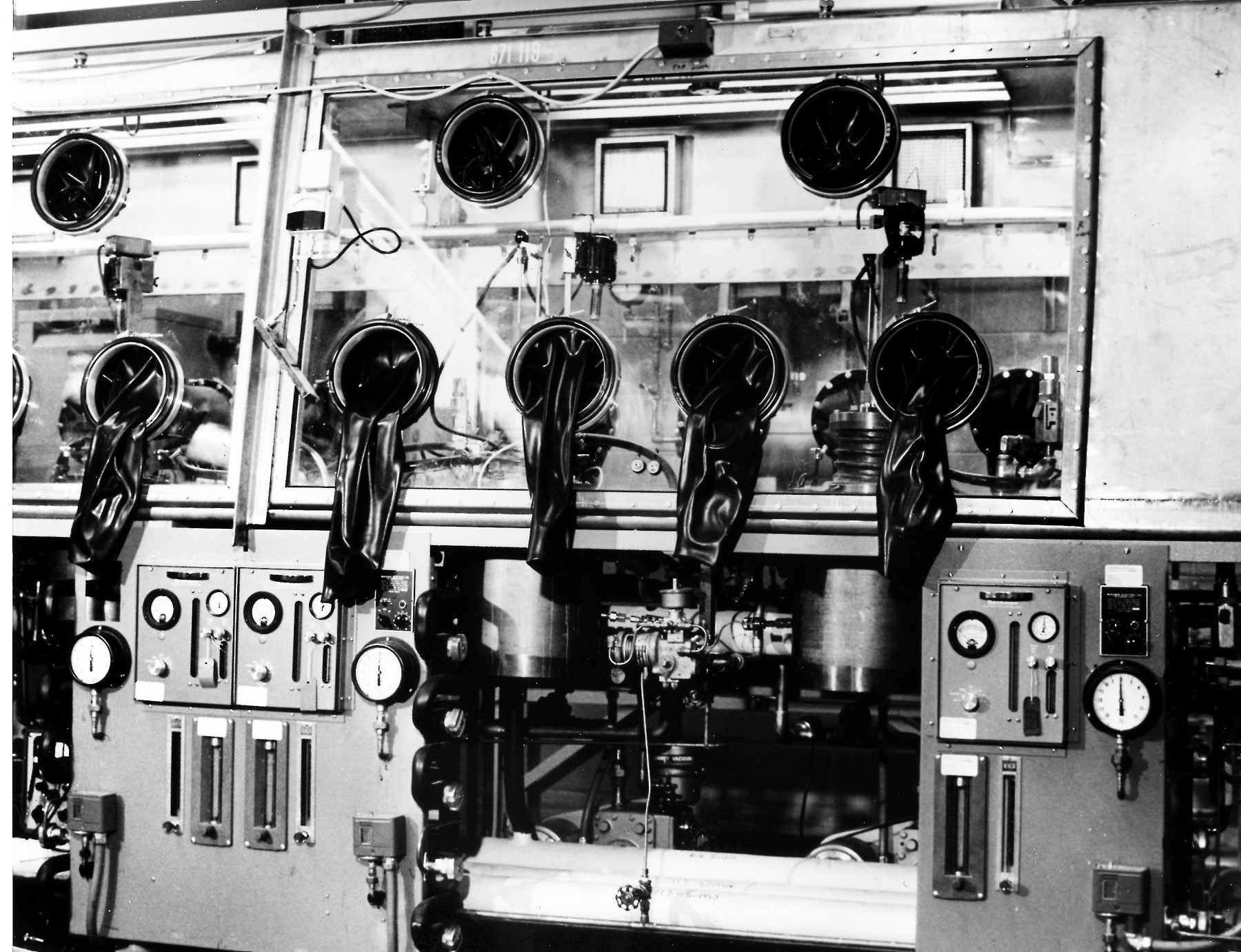 Black and white image of damage to a glove box from the 1969 fire at Rocky Flats