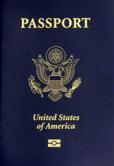 Picture of a United States passport, dark blue cover with gold lettering and United States seal