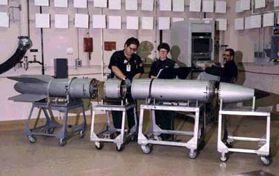 A B61 bomb undergoing disassembly.