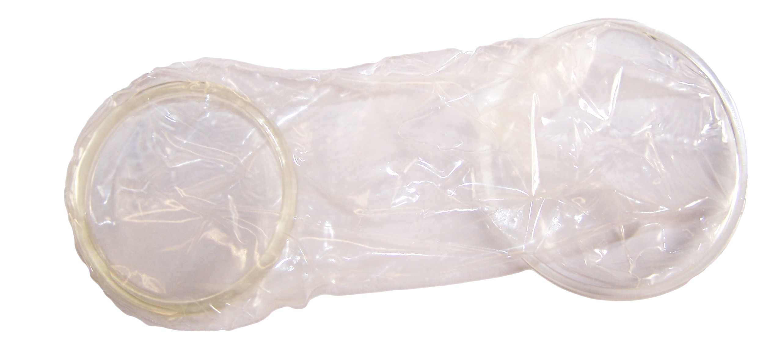 Девушка с презервативом в постели | Премиум Фото