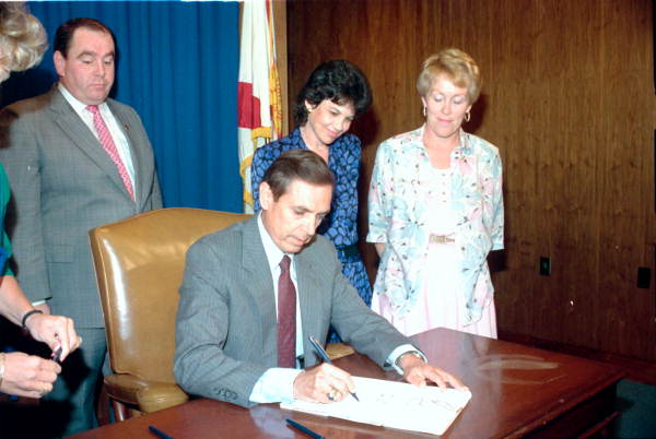 File:Governor Bob Martinez signs the AIDS bill - Tallahassee, Florida.jpg