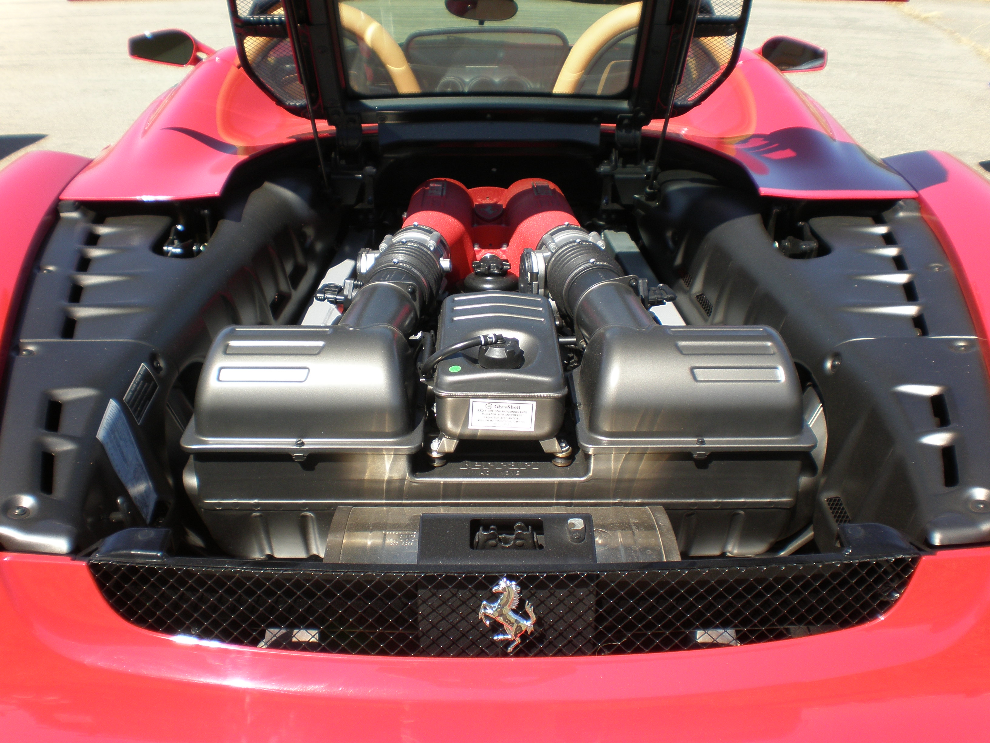 Red Ferrari F430 Spider engine hood open.JPG. 