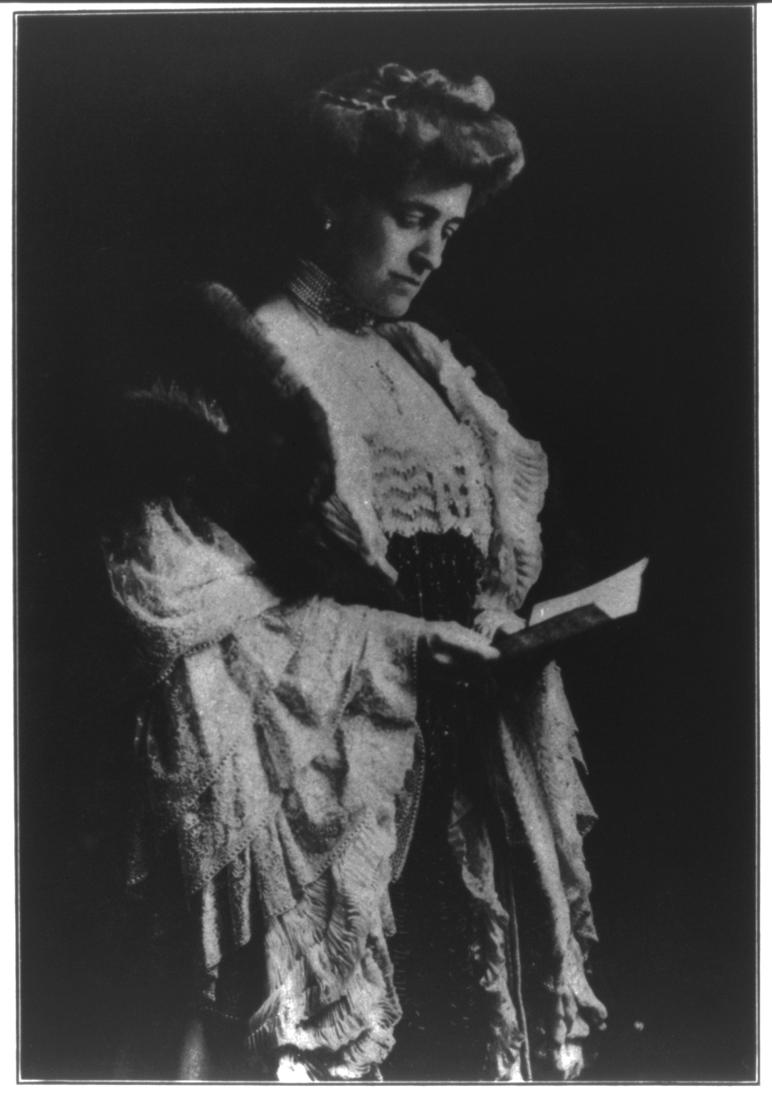 A photographic portrait of Edith Wharton.