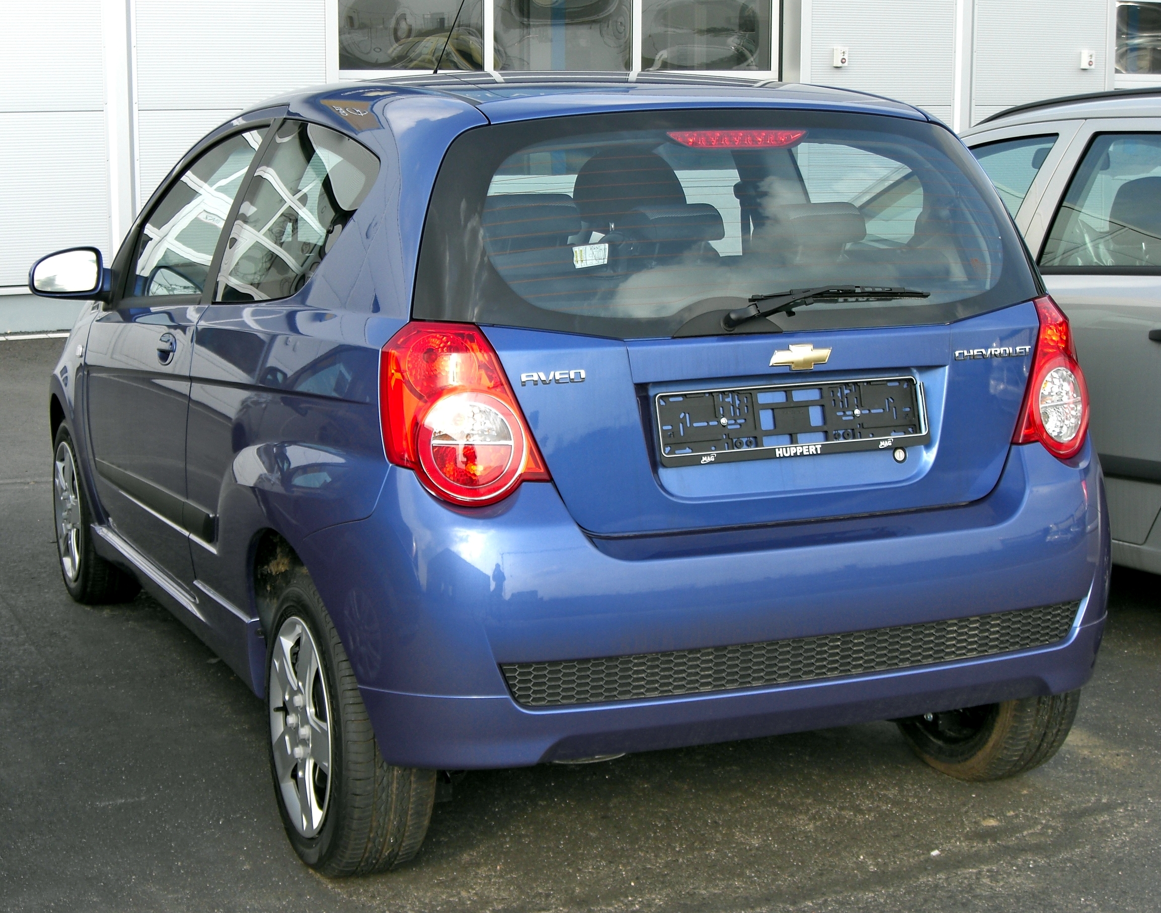 Авео хэтчбек двери. Chevrolet Aveo t250. Aveo t250 хэтчбек. Aveo Blue t250. Chevrolet Aveo 2006 зад.