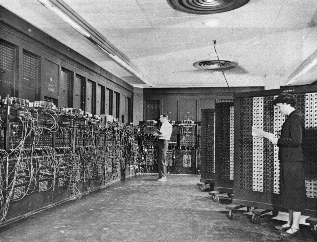Glen Beck and Betty Snyder program the ENIAC in building 328 at the Ballistic Research Laboratory. U.S. Army Photo, Public domain, via Wikimedia Commons.