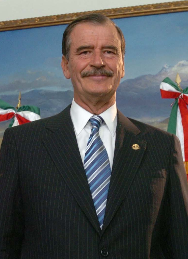 Former Mexican President Vicente Fox waits for an autograph prior