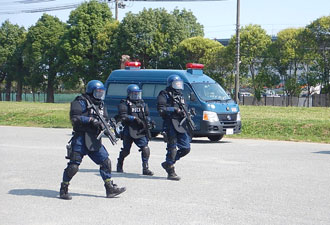 File:HPP AFS officers walk.jpg