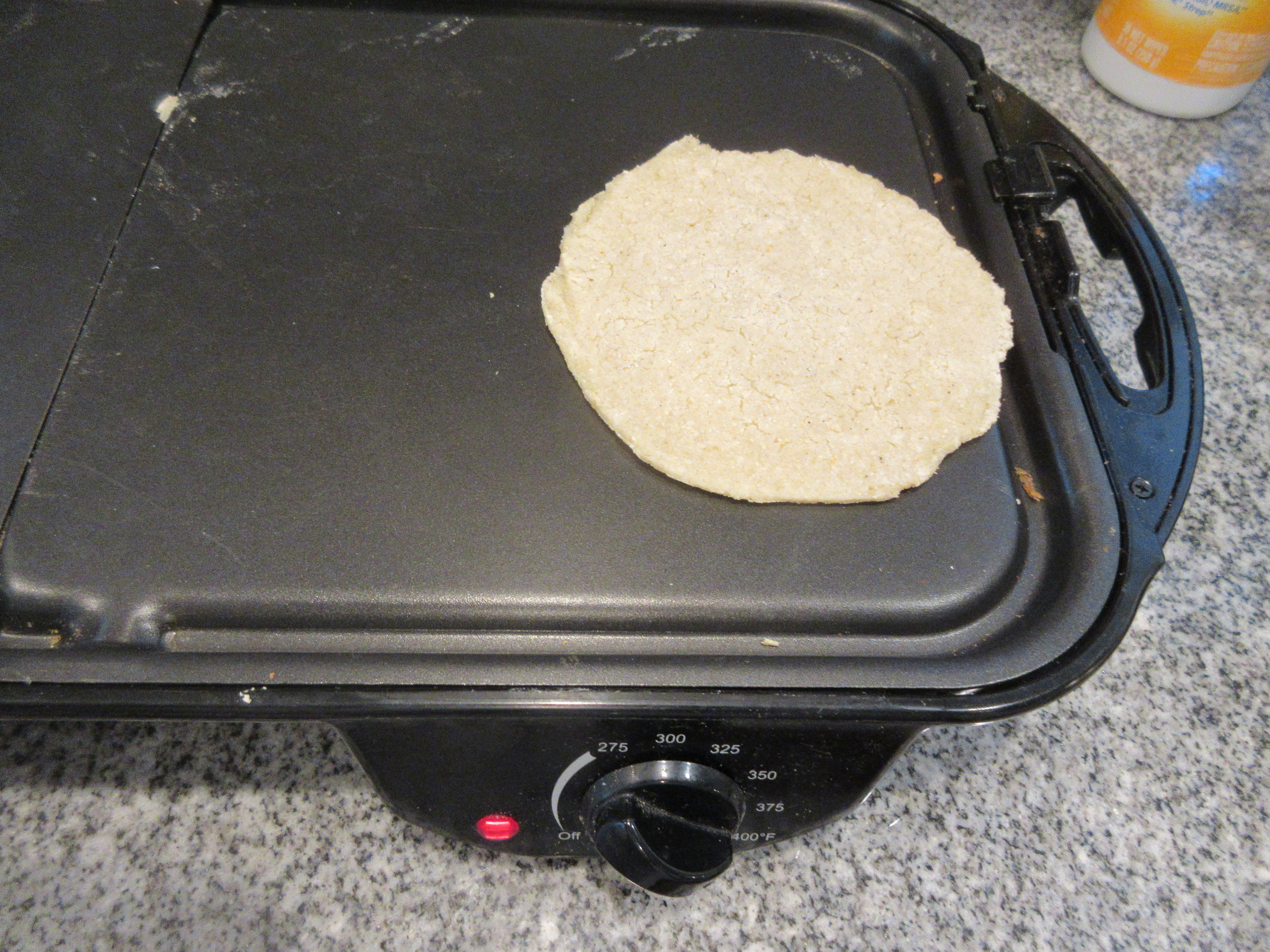 File:Tortilla cooking on an electric griddle 02.jpg - Wikimedia Commons