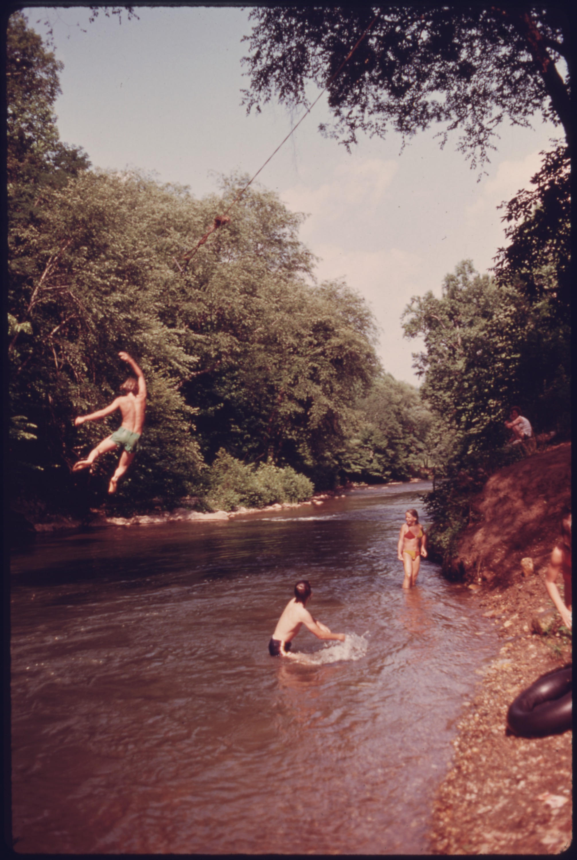 File:CHILDREN AT PLAY ON A ROPE SWING AT BIG ROCK, THE FAVORITE