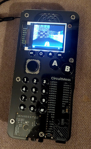 A CircuitMess Ringo phone, running a video game.