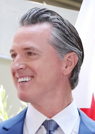 File:Governor Newsom and Canadian PM Trudeau signing agreement during the 9th Summit of the Americas (1) (cropped).jpg